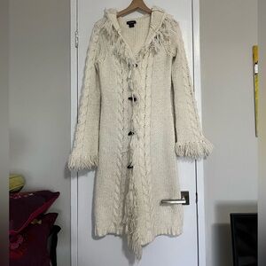 Long white cable knit cardigan sweater with fringe and wood buttons & hood